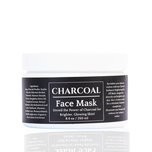 A jar of charcoal face mask with a label that reads 'CHARCOAL Face Mask. Unveil the Power of Charcoal for Brighter, Glowing Skin.