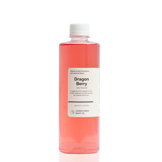 A pink bottle of Dragon Berry Jelly Cleanser on a white background.
