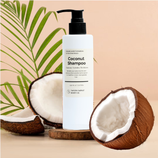 Coconut shampoo bottle with coconuts and palm leaves on a beige background