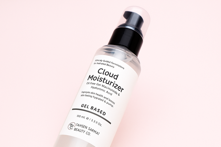 Cloud Moisturizer bottle with label on a white background