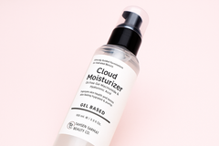 Cloud Moisturizer bottle with label on a white background