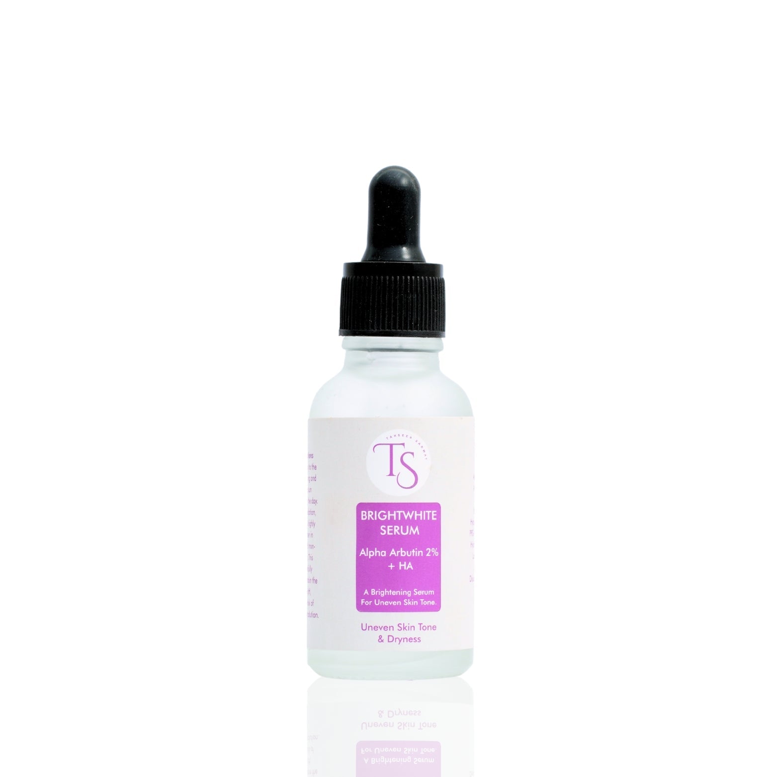 A clear glass bottle with a dropper containing a white liquid, labeled as BrightWhite Serum Alpha Arbutin, indicating it is a Alpha Arbutin serum designed for brightening the skin.