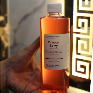 Dragon fruit-based cleanser shown with citrus slice and smooth skin visuals

