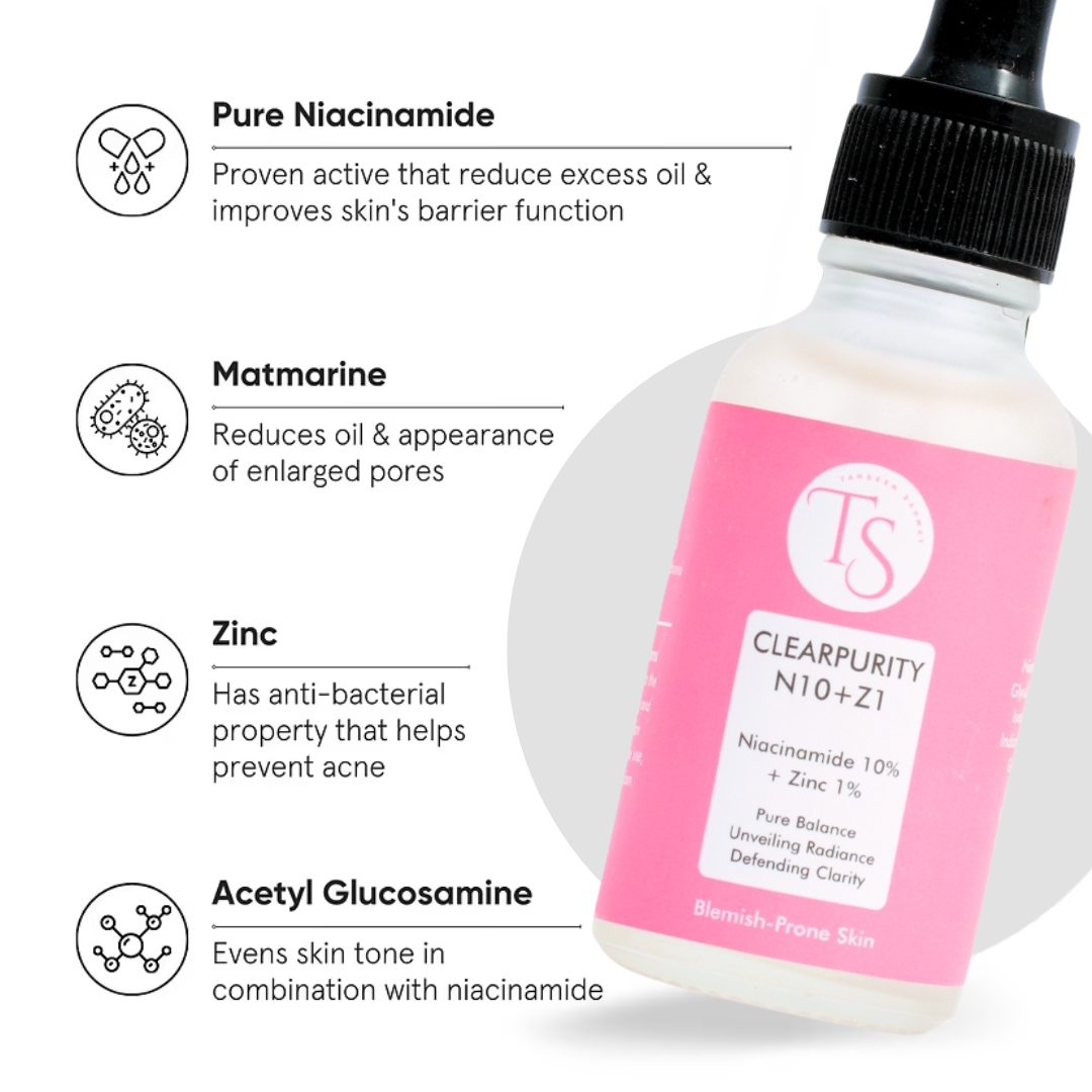 Skincare product with pink label and black dropper, featuring ingredients and benefits on a white background.