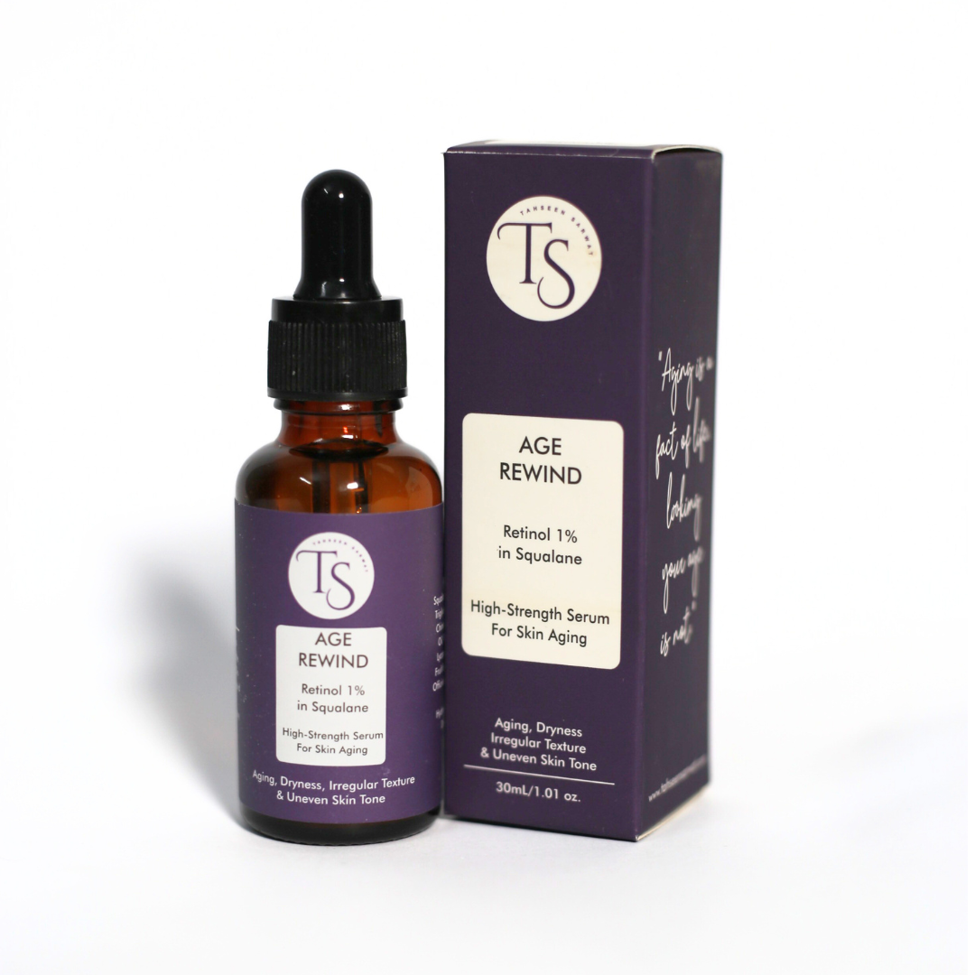 Retinol serum bottle next to hyaluronic acid and ceramide ingredients for balanced use