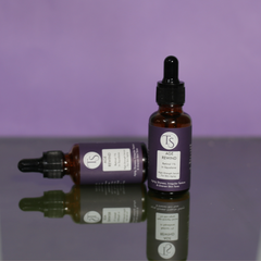 Serum bottle placed beside a close-up of even, refined skin texture