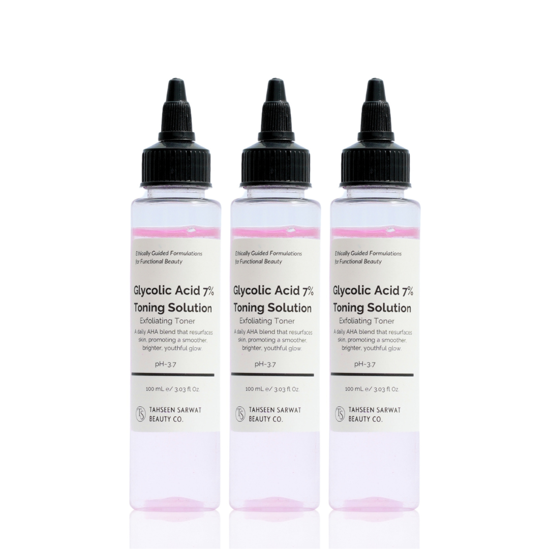 Three bottles of Glycolic Acid 7% Toning Solution on a white background